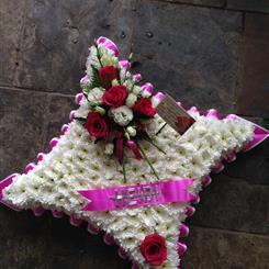 Pink and white massed cushion