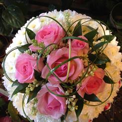 Massed white and pink posy pad